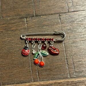 Silver and Red Charm Brooch